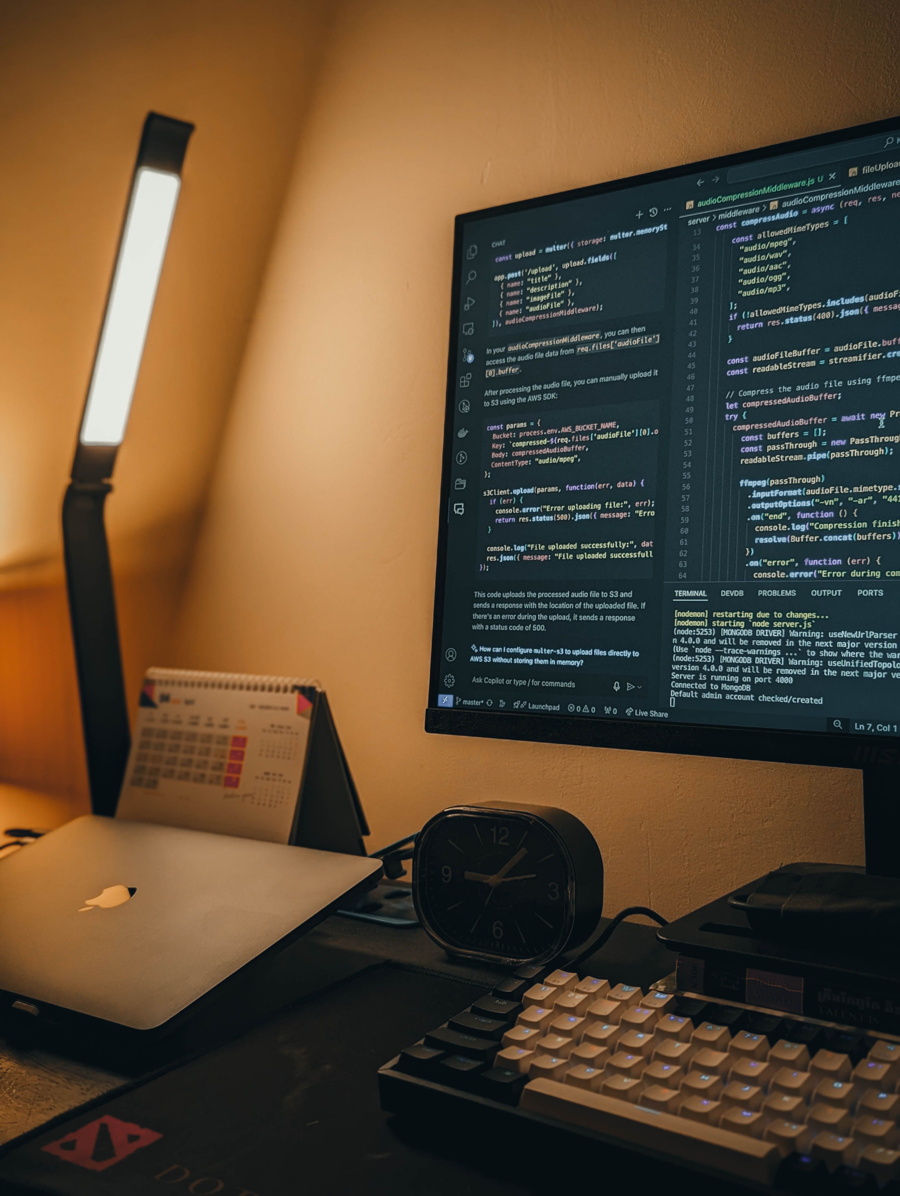 Developers building software together in a modern office
